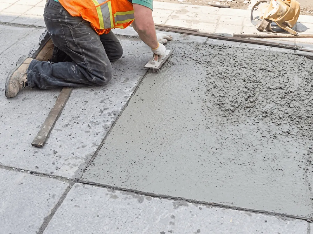 Professional repairing a concrete floor in Honolulu, HI